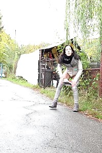 Intriguing Nerdy Babe In Glasses Pisses In Public