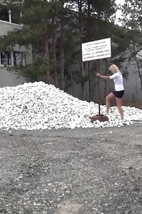 Good-looking Nag Pisses Onto A Pile Of Rubble