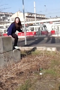Black-haired With Long Hair Pisses In Public View
