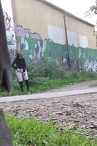 Sexy Brunette Doll Squats On A Path To Piss