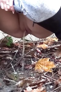 An Innocent Brunette Takes A Few Attempts To Piss