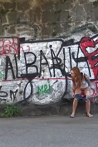 Dazzling Ginger Squats To Pee In Woods