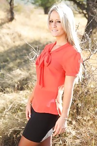 Beautiful Blonde Erika Posing Outdoor In Her Office Skirt And Stockings