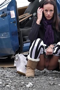Eveline Squats Behind An Abandoned Vehicle To Pee