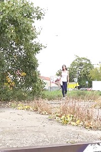 Exotic Brunette Cynthia Vellons Taking A Leek Outside