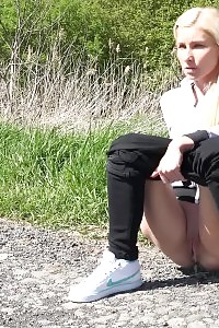 Confident Light-haired Squatting To Pee
