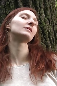 Enchanting European Leans In Front Of A Tree To Pee