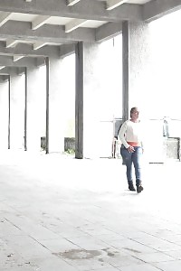 Black-haired Bitch In White Sweater Pisses Public