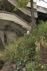 Brunette Bitch Pisses Next To A Flowing River