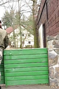 Lovely Dame Pisses Onto A Wooden Terrace