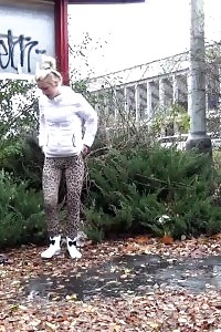 Sensational Blonde Minx Pissing In Public Near Buildings