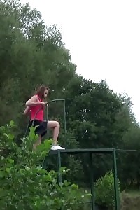 Good-looking Black-haired Pisses Next To A Neighbor Pond