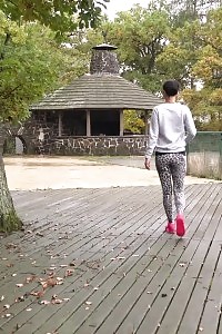 Black Haired Doll Squats To Pee Outside