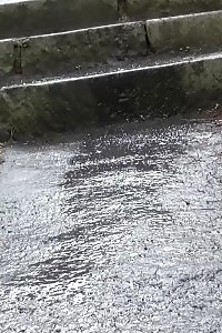 Blonde Honey Pissing On The Bottom Of Some Steps