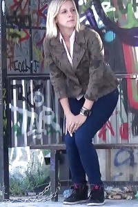 Blonde Has Fun As She Pissing While Standing