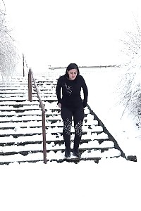 Black Haired European Relieves Herself In Public