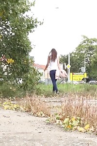 Exotic Brunette Cynthia Vellons Taking A Leek Outside