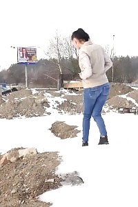 Magnificent Girl Squats In The Snow And Pisses Outside