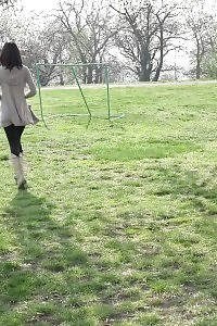 Eveline Neill Squats And Taking A Leek On Picnic Bench