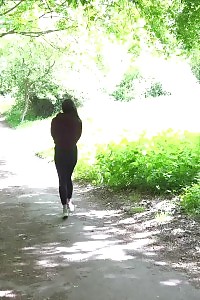 Good-looking Black Haired Girl Squats And Pees Outside