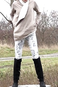 Black Haired Hottie Relieves Herself In Public
