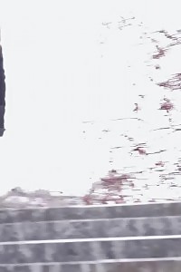 Black Haired Babe Pisses Down Concrete Steps