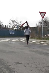 Brunette Lady Pisses By A Public Car Park