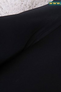 Thalia Confidently Poses Over The Bar Stool In Her Sexy Evening Black Dress