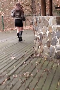 Captivating Black-haired In Boots Pisses Outside