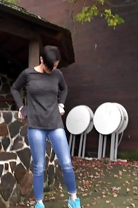 Lovely Girl In Sneakers Squats To Piss Outside