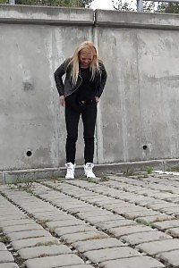 Appealing Blonde Squats Outside To Piss In The City