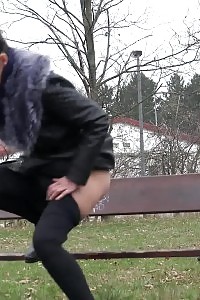 Raven Haired Bitch Pisses Over Wooden Bench