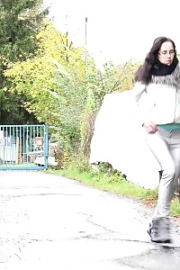 Intriguing Nerdy Babe In Glasses Pisses In Public