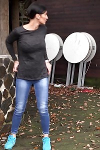 Lovely Girl In Sneakers Squats To Piss Outside