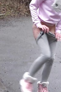 Light-haired Beauty Claudia Pisses Down A Drain Outside