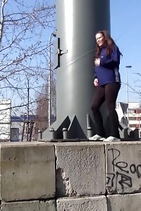 Black-haired With Long Hair Pisses In Public View