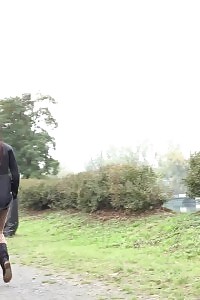 Brunette Beauty In Pants Pisses Outside