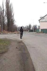 Outstanding Brunette Doll Pisses Behind A Schoolbus Stop