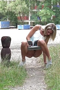 Appealing Blonde Claudia Macc Squats To Pee