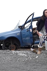 Eveline Squats Behind An Abandoned Vehicle To Pee
