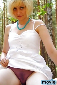 Kirsty Blue Strips On The Sawmill As She Exhibits Her Sheer Panties