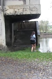 Dazzling Brunette Pisses Into A Flowing Watershed