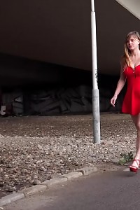 Charming Girl In Red Dress Pisses On The Ground