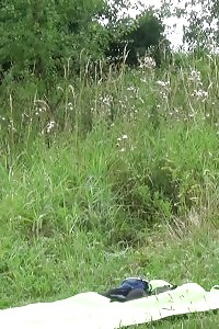 Half-naked Blonde Sunbather Gets To Pee