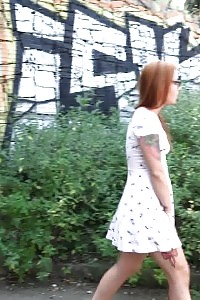 Ginger In Glasses Pissing Under A Bridge