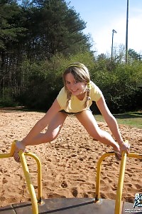 Kitty Shows Off Her Young And Appealing Body As She Flashes Her Panties At The Playground