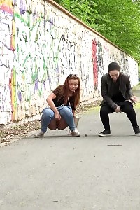 Smashing Amateurs Piss Together On A Path In City