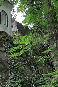 Good-looking Blonde Makes A Moist Waterfall On A Ledge