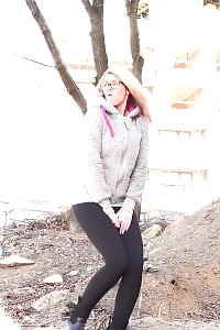 Delightful Light-haired In Glasses Pisses Over The Ground