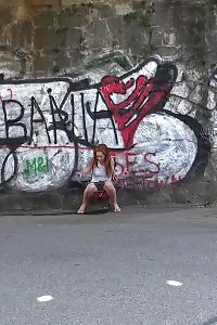 Dazzling Ginger Squats To Pee In Woods